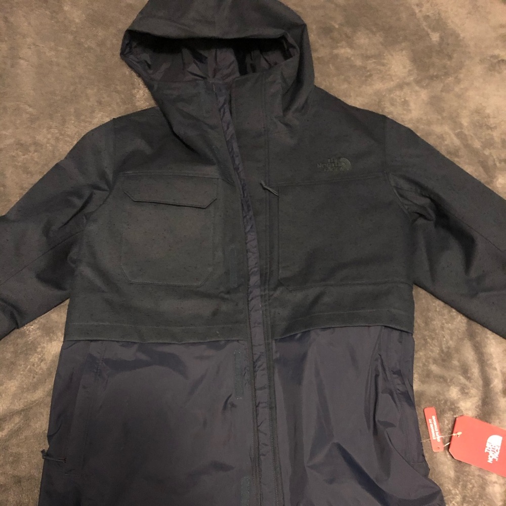 The North Face raincoat, size large.